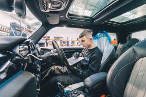 Mr Tyre mechanic performing car diagnostic checks