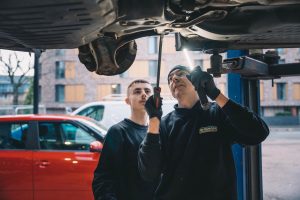Mr Tyre technicians performing car service checks