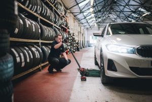 Mr Tyre Nottingham (Carlton Rd) mechanic setting up car for checks.