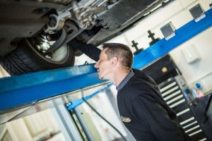 Mr Tyre technician doing inspection