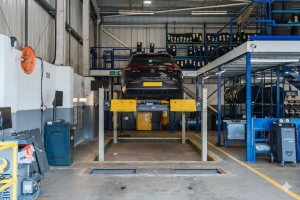 Black Mercedes Benz at Mr Tyre Rochdale waiting to be worked on.